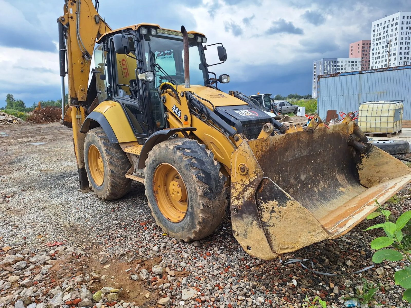 Caterpillar 444 Экскаватор-погрузчик