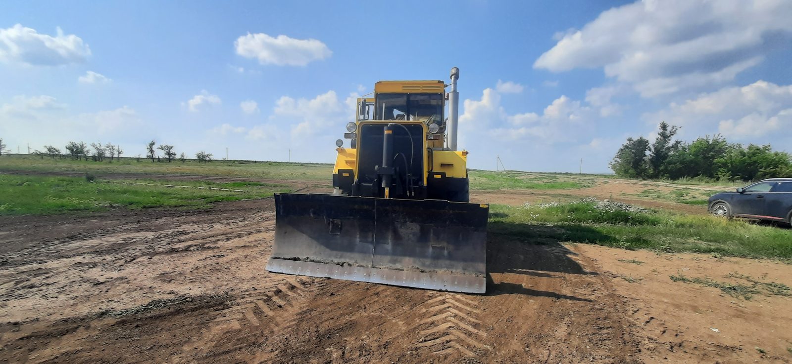 Петербургский Кировец К-703МА Бульдозер колесный