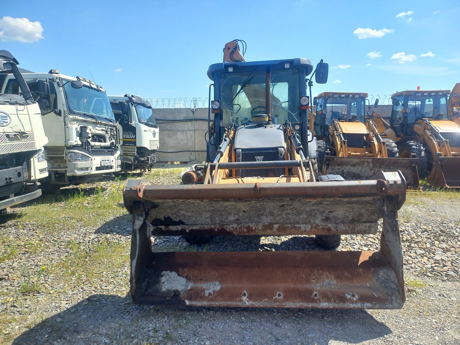 Case 570 Экскаватор-погрузчик