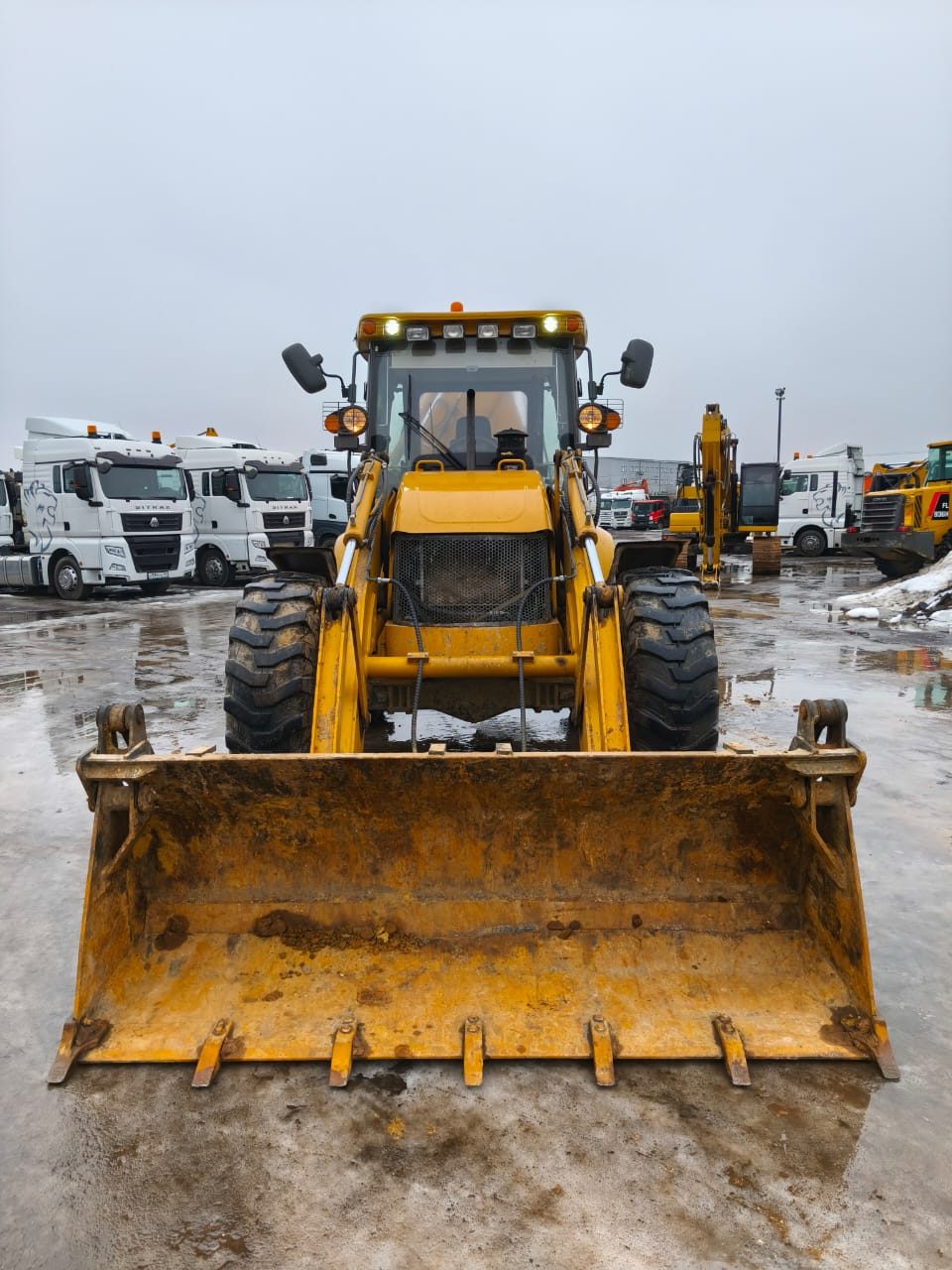 Shanmon 388 Экскаватор-погрузчик