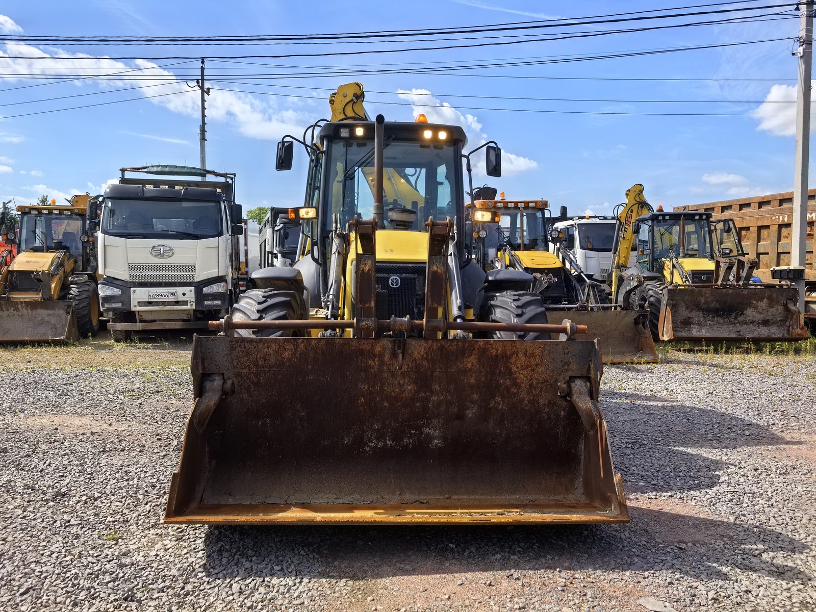 New B115* Экскаватор-погрузчик