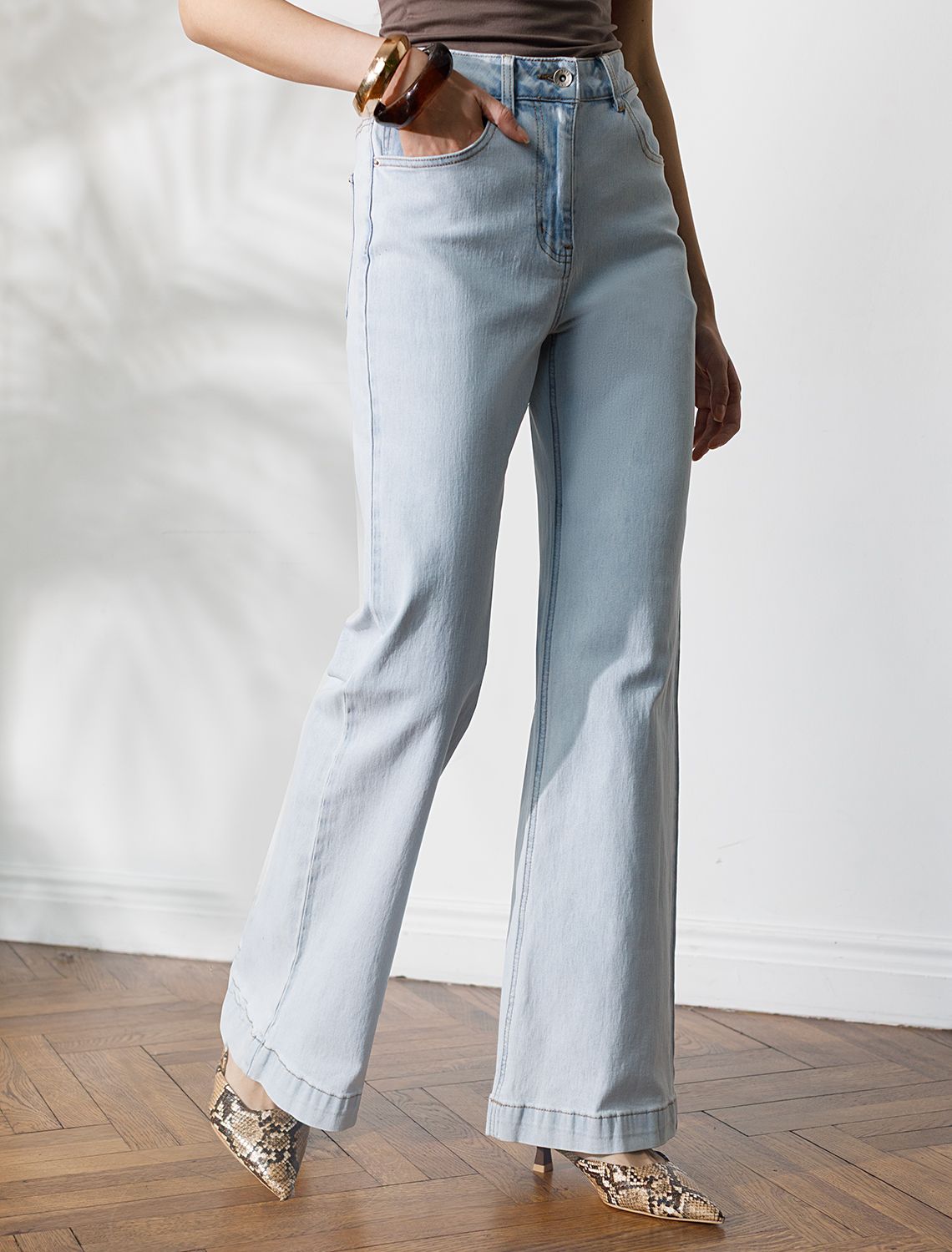 картинка Джинсы женские светло-голубой магазин Одежда+ являющийся официальным дистрибьютором в России 