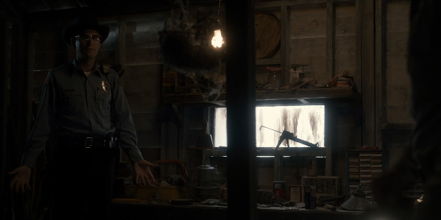 Wide shot frame from Stranger Things — standing, room, hat