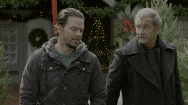 Wide shot frame from Daddy's Home 2 — walking, door, street