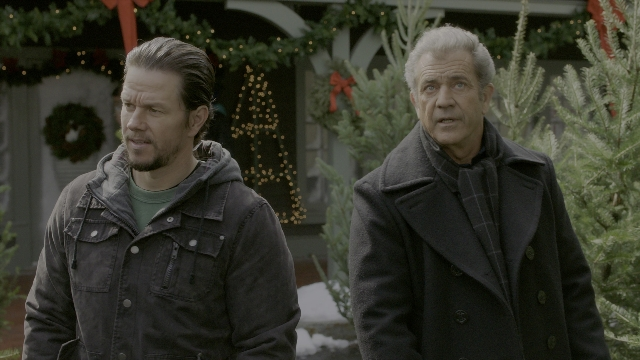 Wide shot frame from Daddy's Home 2 — standing, dialogue, coat