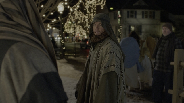 Wide shot frame from Daddy's Home 2 — standing, walking, street