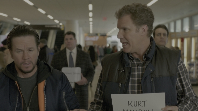 Wide shot frame from Daddy's Home 2 — room, dialogue, shirt