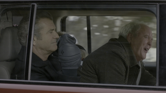 Wide shot frame from Daddy's Home 2 — sitting, street, car