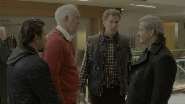 Wide shot frame from Daddy's Home 2 — standing, dialogue, jacket