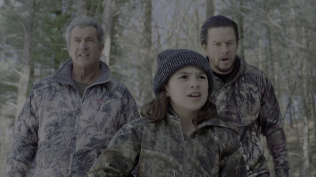 Wide shot frame from Daddy's Home 2 — walking, jacket, beard