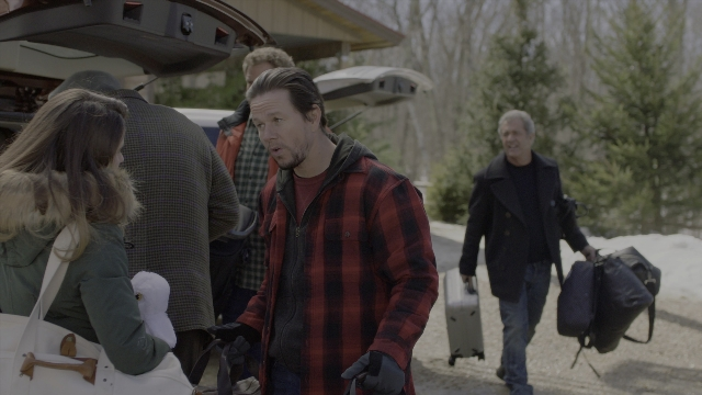 Wide shot frame from Daddy's Home 2 — walking, street, car