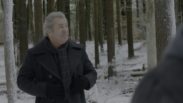 Wide shot frame from Daddy's Home 2 — standing, coat, face