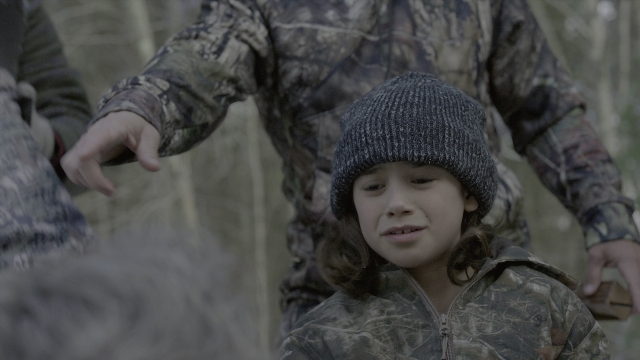 Medium shot frame from Daddy's Home 2 — standing, shirt, jacket
