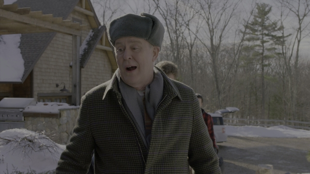 Wide shot frame from Daddy's Home 2 — standing, coat, face