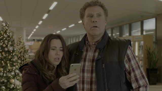 Wide shot frame from Daddy's Home 2 — standing, dialogue, phone