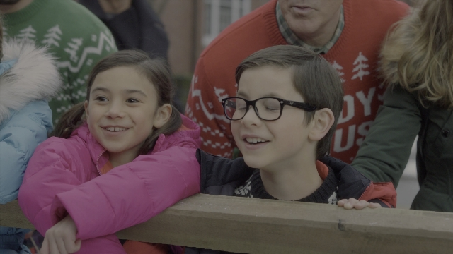 Medium shot frame from Daddy's Home 2 — sitting, standing, face