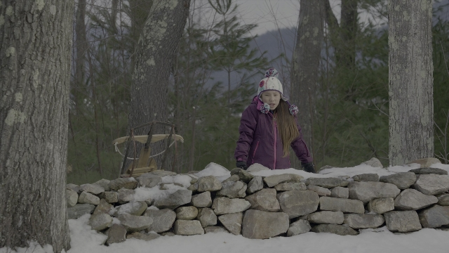 Wide shot frame from Daddy's Home 2 — standing, chair, face