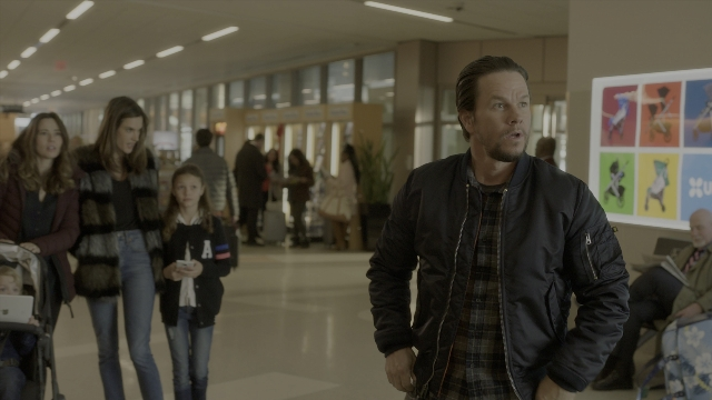 Wide shot frame from Daddy's Home 2 — sitting, standing, walking