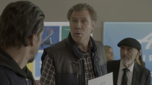 Wide shot frame from Daddy's Home 2 — room, dialogue, suit