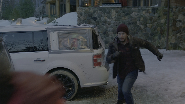 Wide shot frame from Daddy's Home 2 — walking, street, car