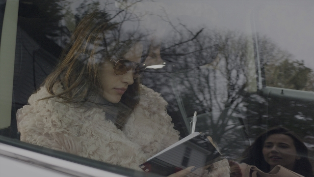 Wide shot frame from Daddy's Home 2 — sitting, street, car