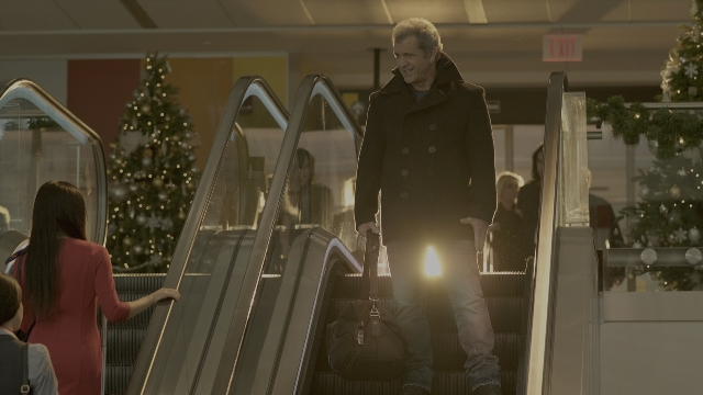 Wide shot frame from Daddy's Home 2 — walking, coat, dress
