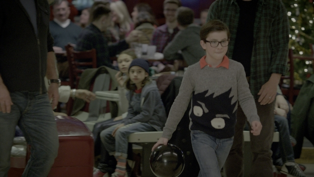 Wide shot frame from Daddy's Home 2 — sitting, standing, walking