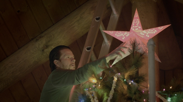 Wide shot frame from Daddy's Home 2 — standing, hand, shirt