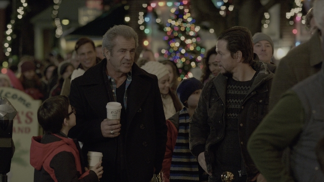 Wide shot frame from Daddy's Home 2 — walking, dialogue, street