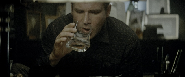 Wide shot frame from Blade Runner — sitting, restaurant, face