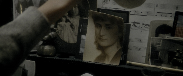 Wide shot frame from Blade Runner — room, mirror, dress