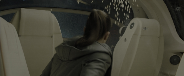 Frame from Blade Runner 2049 — sitting, car, hair