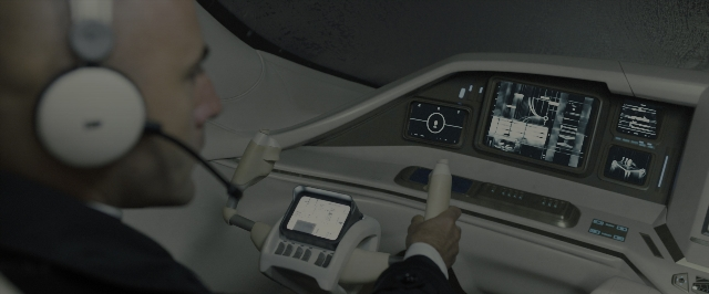 Wide shot frame from Blade Runner 2049 — sitting, car, hand
