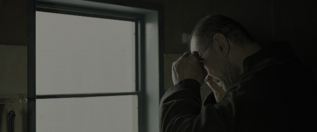 Wide shot frame from Blade Runner 2049 — sitting, standing, room