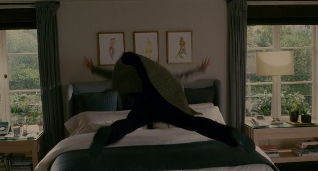 Frame from The Holiday — room, bed, phone
