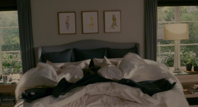 Wide shot frame from The Holiday — room, bed, house