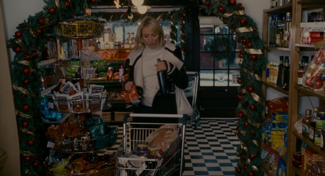 Wide shot frame from The Holiday — face, bag, person