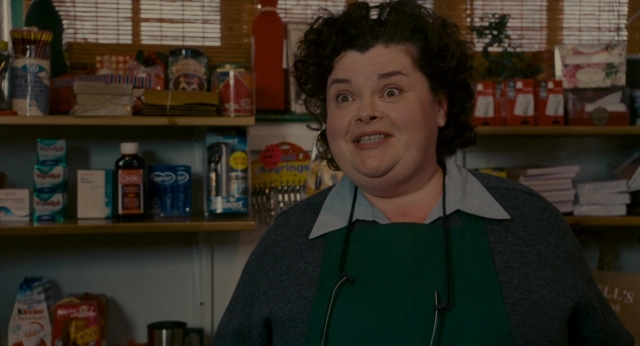 Medium shot frame from The Holiday — standing, kitchen, face