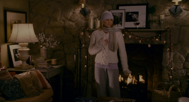 Wide shot frame from The Holiday — standing, room, house