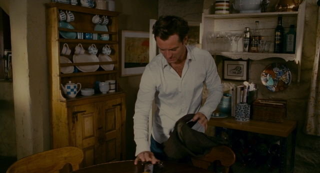 Frame from The Holiday — standing, table, kitchen