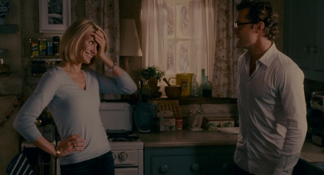 Wide shot frame from The Holiday — standing, room, kitchen