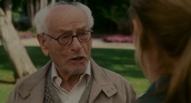 Wide shot frame from The Holiday — standing, face, hair