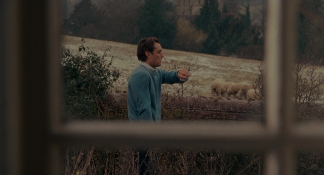 Frame from The Holiday — standing, hand, face