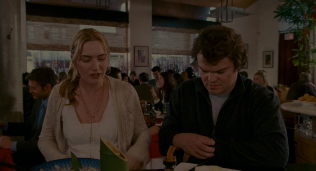 Wide shot frame from The Holiday — sitting, plate, table