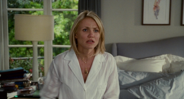 Wide shot frame from The Holiday — sitting, room, bed