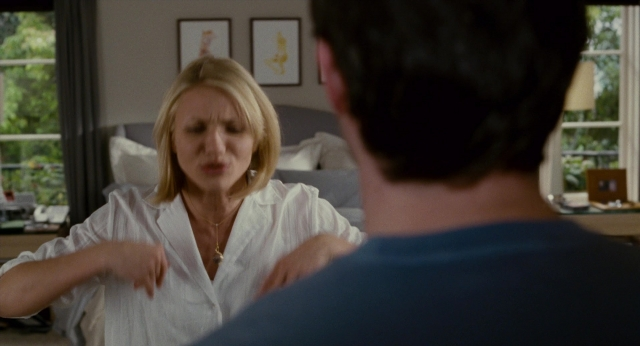 Medium shot frame from The Holiday — sitting, standing, room