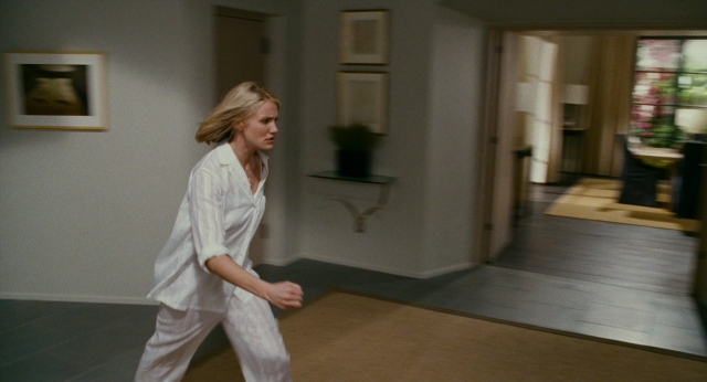 Wide shot frame from The Holiday — walking, hand, face