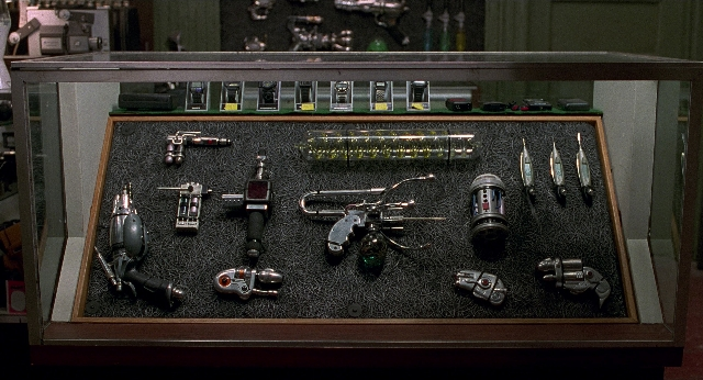 Wide shot frame from Men in Black — gun, weapon