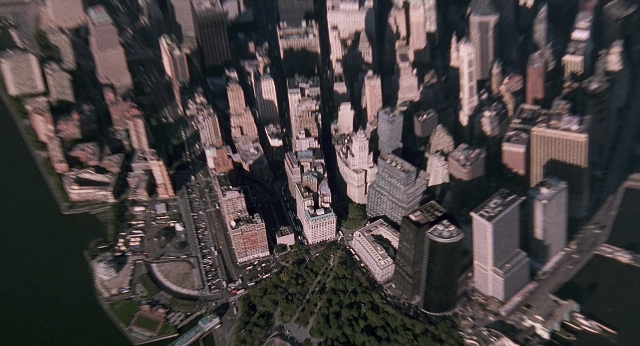 Wide shot frame from Men in Black — water, skyscraper