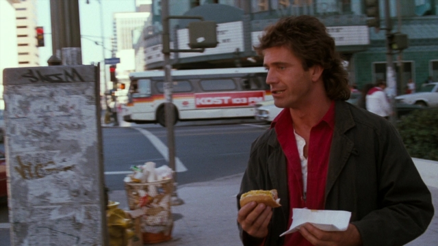Frame from Lethal Weapon — standing, walking, street